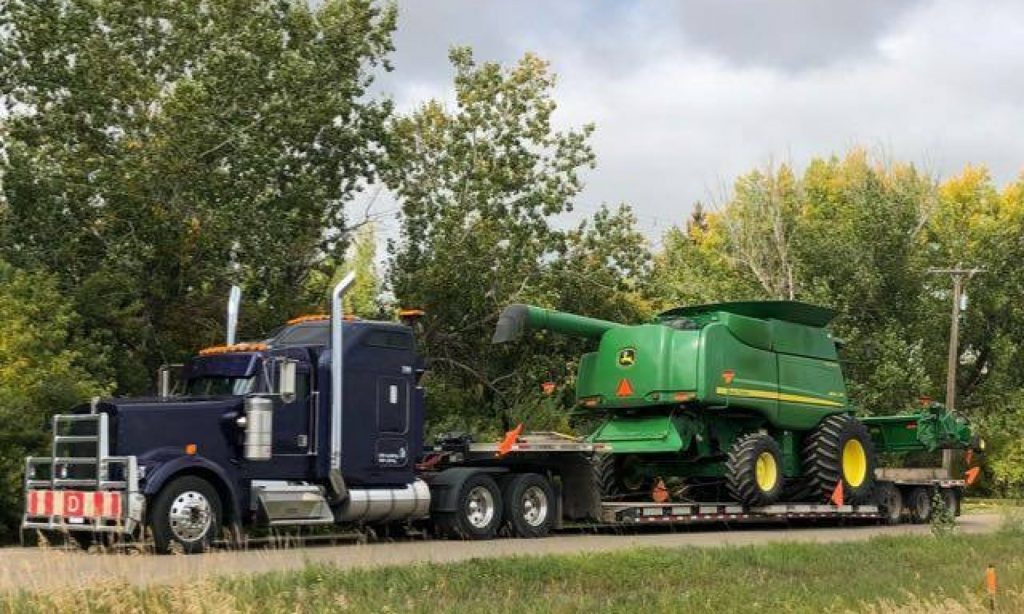 FROESE TRUCKING & HARVESTING LTD. BOX 634, BOW ISLAND, AB T0K0G0